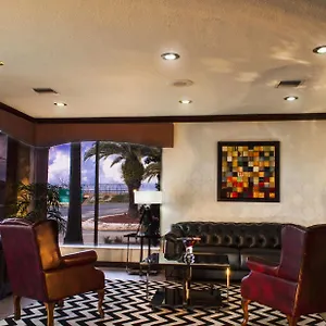 Отель Ramada By Wyndham Orlando South ***